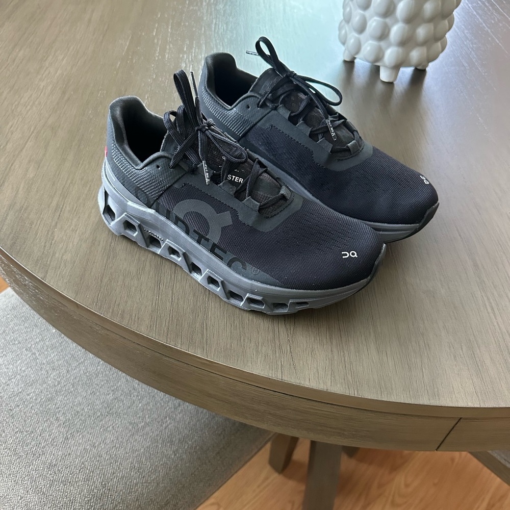 On Running Black and Gray Athletic Shoes with CloudTec Sole